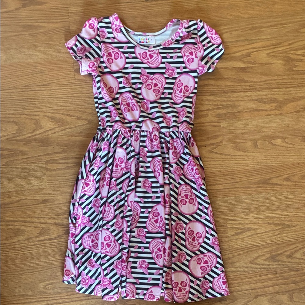 Adorable and unique dress with stripes,skulls,and roses